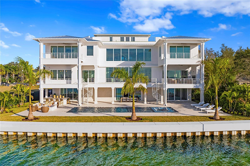 96 Martinique Avenue: a custom-built coastal masterpiece with commanding open bay views.
