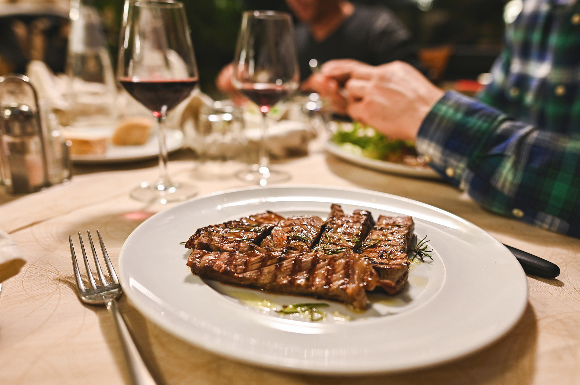 Roasted red meat in a plate.