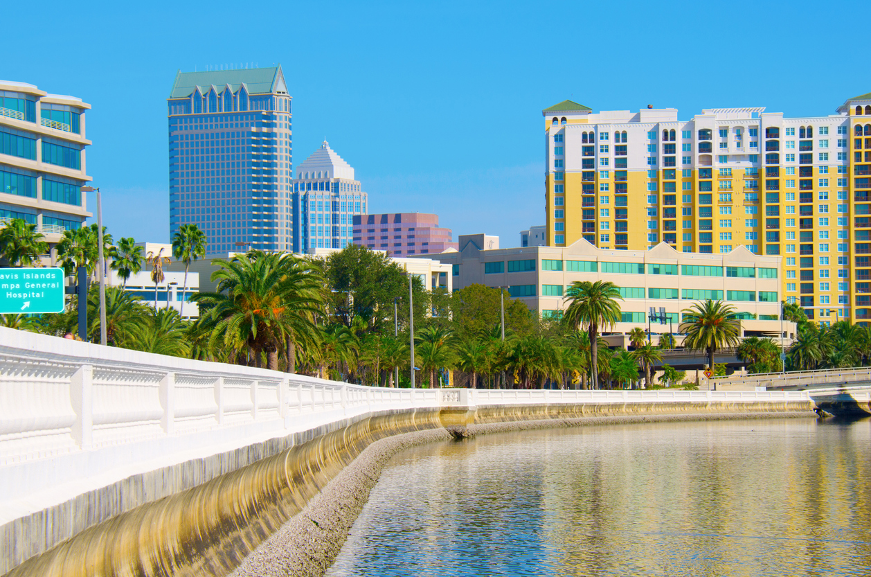 Beautiful view of the Tampa Florida skyline from Bayshore Boulevard with Tampa Bay water in the foreground.