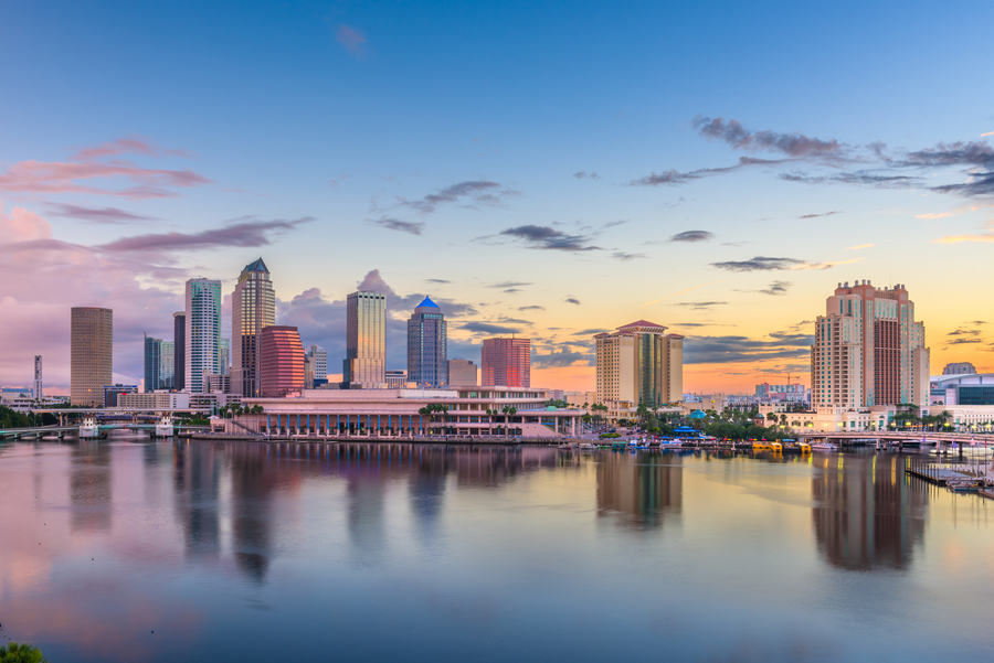Tampa, Florida, USA downtown skyline on the bay at dawn.